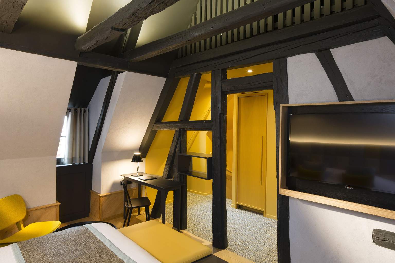 Chambre charmante de l'hôtel Colombier Suites à Colmar